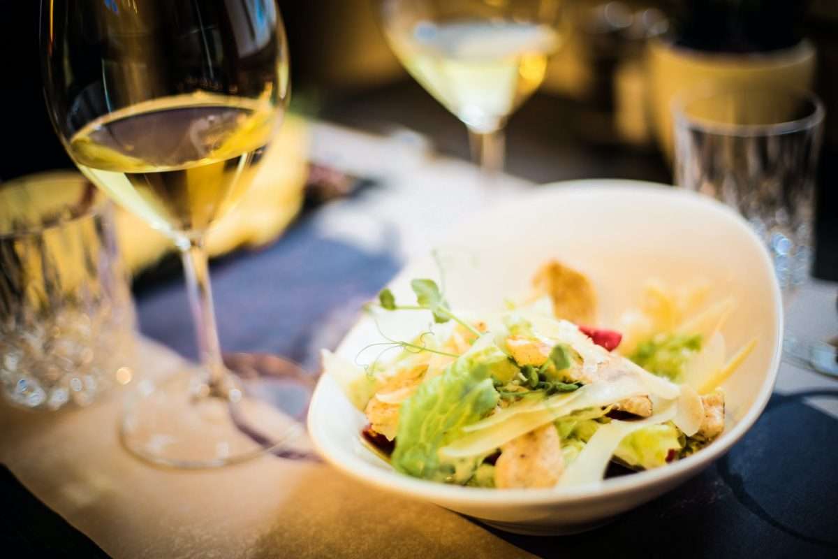 delicious salad with vegetables and herbs in restaurant